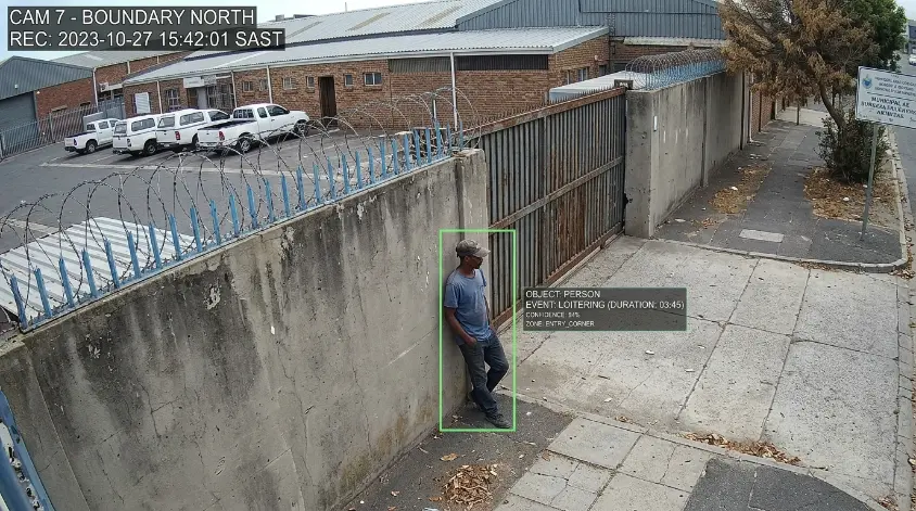 CCTV_monitoring_person_near_wall